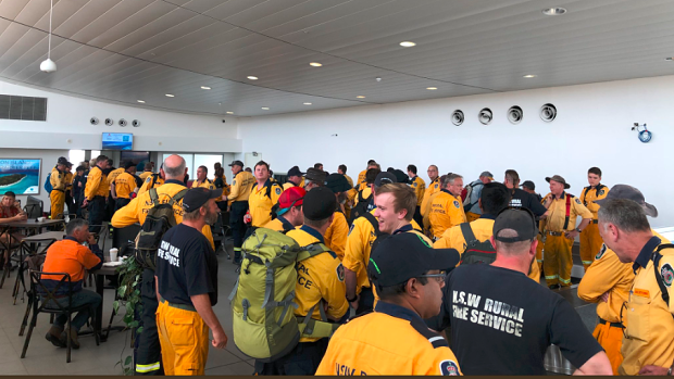 
A taskforce of 100 extra firefighters parachuted in from New South Wales on Tuesday.
