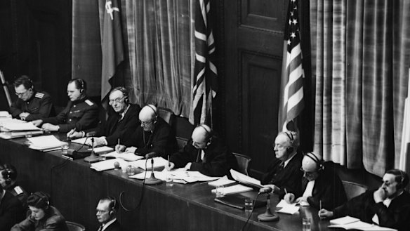 The judges: [L-R] Volchkov, Nikitchenko, Birkett, Sir Geoffrey Lawrence, Biddle, Parker, Donnedieu de Vabres and Falco.