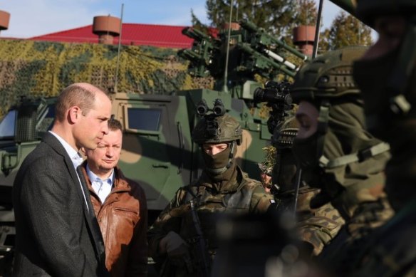 Prince William meeting troops in Poland.