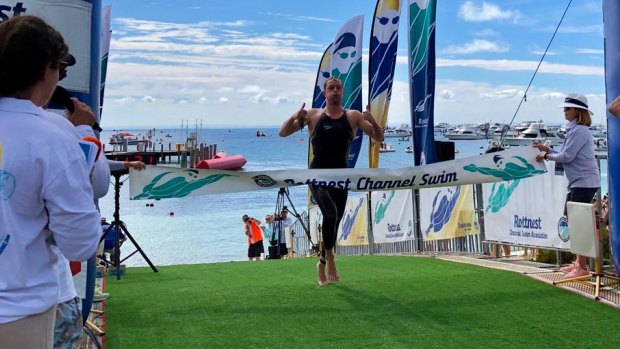 Sam Sheppard was the first male solo swimmer to cross the line at this year's Rottnest Channel Swim, finishing the race in 4 hours, 11 minutes and 22 seconds. 