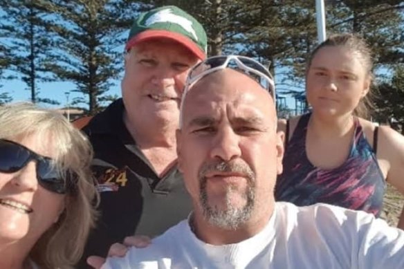 Dwayne Johnstone (centre), pictured with his family, was shot dead in 2019.