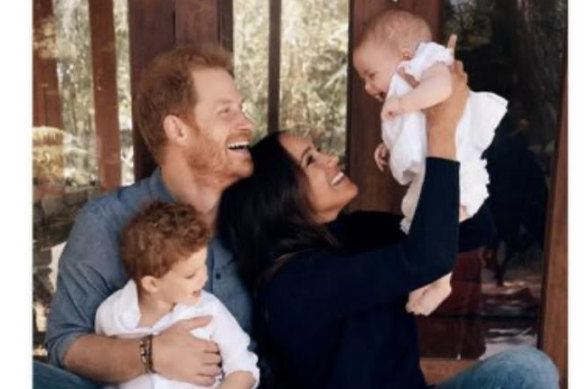 Prince Harry and Meghan in a rare photo with son Archie and daughter Lilibet.