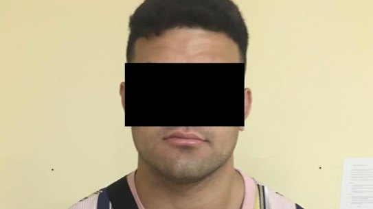 Rugby league player David Fifita in a blacked-out mugshot supplied by Kuta police.