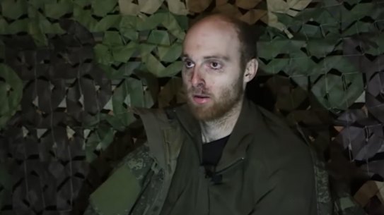 A still from an unverified video posted to YouTube in March that purportedly shows Oscar Jenkins being interviewed.