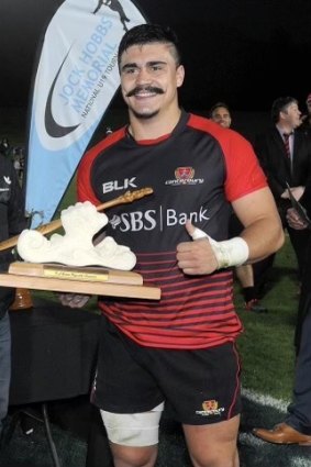 Charlie Gamble accepting a trophy while playing for the Canterbury under-19s in 2016.