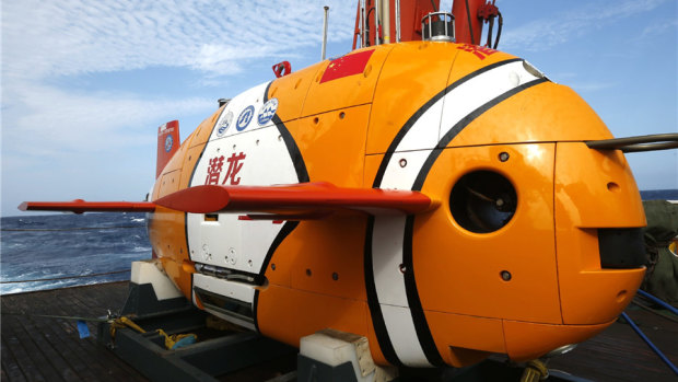 China's newest unmanned submarine drone, Qianglong 3, after its first deep dive – 3500 metres into the South China Sea. Painted like a clownfish, it is designed to explore for resources on the sea floor.