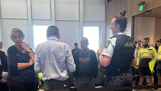 ‘No one leave’: Police called to chaotic council meeting as CEO suspended