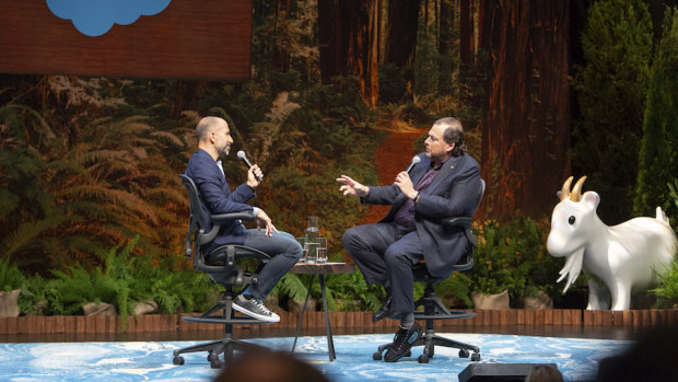 Dara Khosrowshahi (left) is interviewed by Salesforce founder Marc Benioff (right) at Dreamforce in San Francisco. 