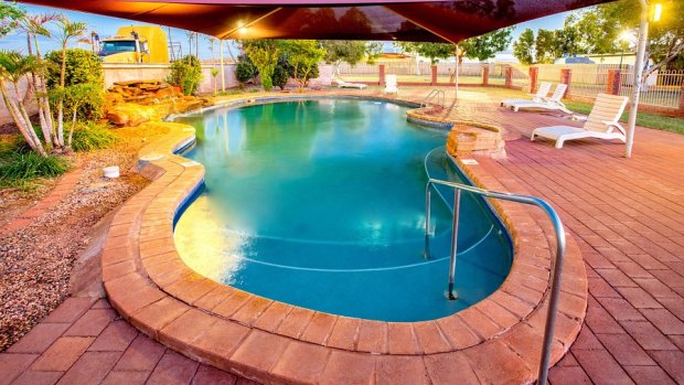 Police claim the man offered free swimming lessons at the Discovery Parks  in Baynton, near Karratha.
