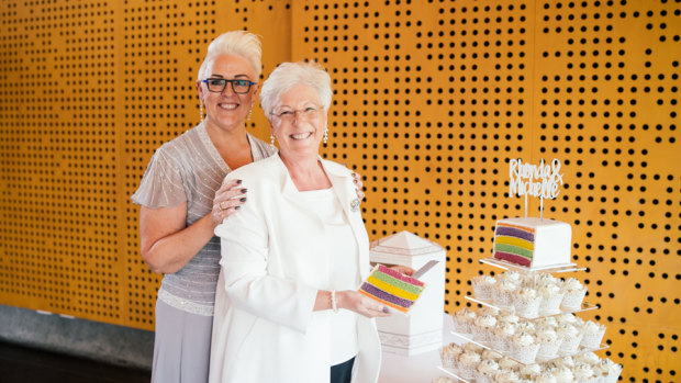 Rhonda (in white jacket) and Michelle Redfern at their wedding in March, 2018. 