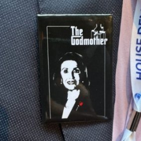 The Godmother pin. Nancy Pelosi was not amused.