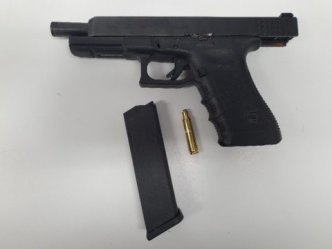The man was found with a Glock handgun at Beenleigh Station.