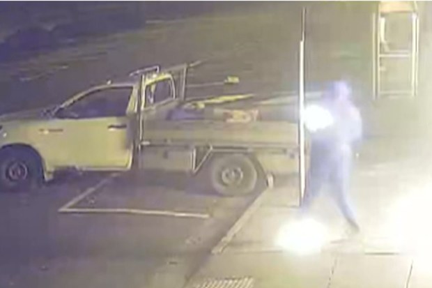 An arsonist is fighting for life after accidentally setting himself on fire while allegedly torching a tobacco shop.