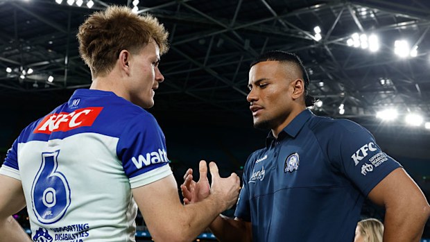 Lachlan Galvin and Stephen Crichton of the Bulldogs shake hands.