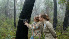 Cameras being installed and checked - Dr Emma Spencer (right) with a volunteer.