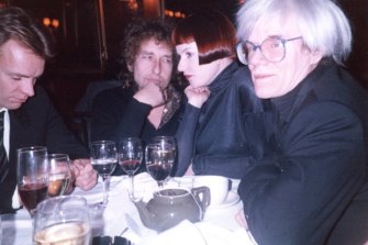 Sting, Bob Dylan, Nell Campbell and Andy Warhol at Nell’s nightclub in New York.