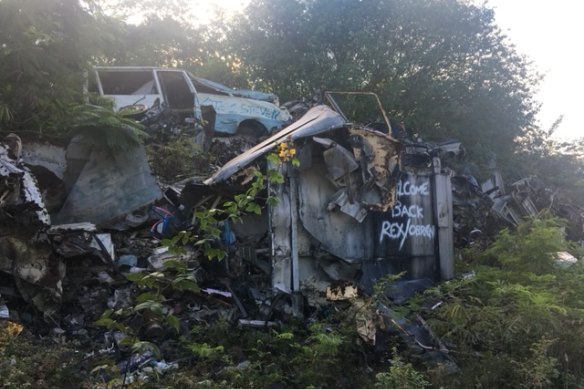 Wrecked cars on Nauru, which remained poverty stricken in 2018 despite the billions Australia spent there.