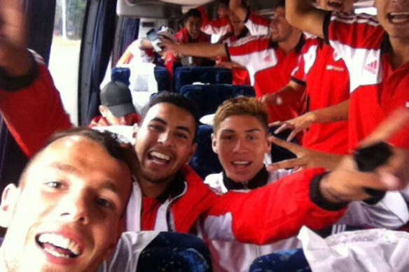 Gavin De Niese (bottom left) with Gonzalo Montiel (right) on the River Plate team bus.