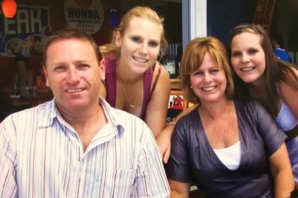 Tony Jenkins with his wife, Sharon and daughters Kim (left) and Cidney (right).