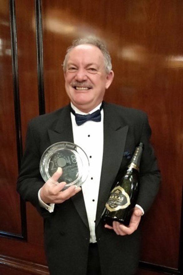 Ed Carr receives his Lifetime Achievement Award at the Champagne & Sparkling Wine World Championships in London in 2018.