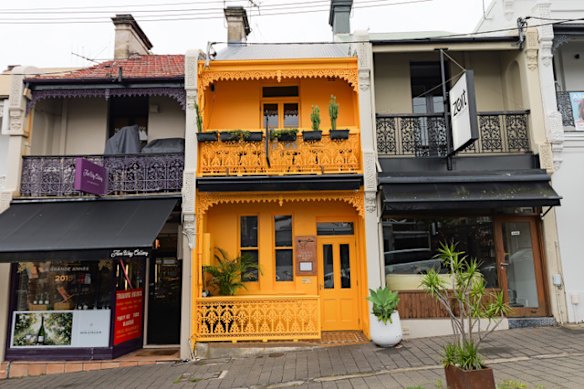 The vibrant facade of new Venezuelan restaurant TQM.