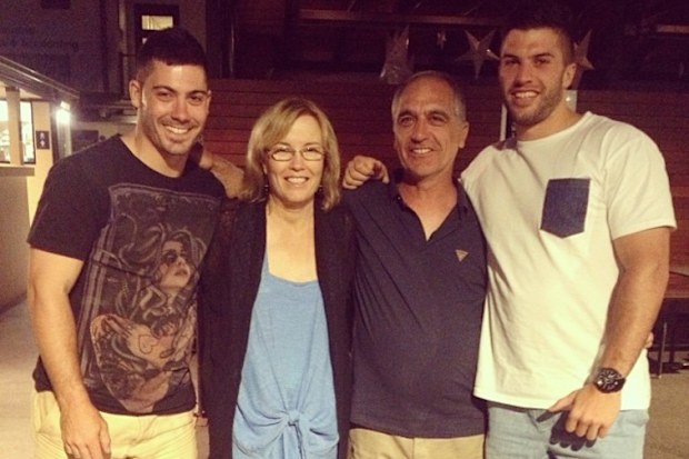 James Tedesco with his parents and brother.