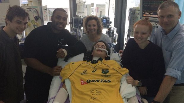 Queensland Reds and Wallabies player Samu Kerevi visited Conor Tweedy, 16, in hospital and gave him a signed jersey.