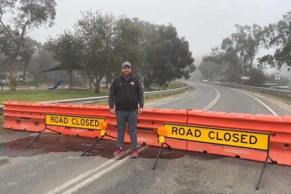 Barmah publican Mat Gissing at the previously unmanned Barmah Bridge barriers.