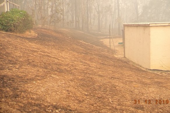 The back of Jacqui and Ron Thompson's shelter where they rode out the fires.