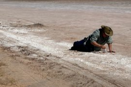 Sophie Cape, in the pose of The Dying Gladiator collecting salt.