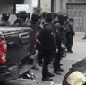 Police doused “neo-Nazis” in pepper spray as they tried to disrupt a refugee rally.