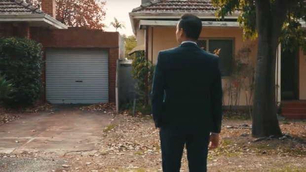 Mr Woon in front of the former homes on the site. 