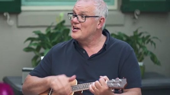 Scott Morrison playing the ukulele. 