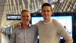 AFR journalist Mike Smith with ABC journalist Bill Birtles as they prepared to leave China on Monday night.