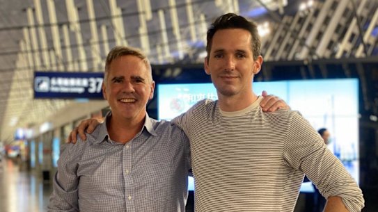 AFR journalist Mike Smith with ABC journalist Bill Birtles as they prepared to leave China on Monday night.