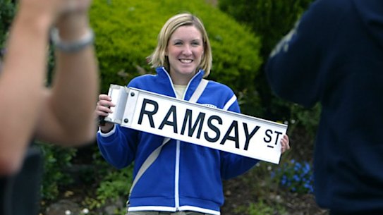 British tourists on a neighbours tour visit Ramsay st.