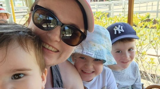 Brisbane mother Amelia and her young family. Two of her children were hospitalised with influenza, while she herself was also battling an infection.