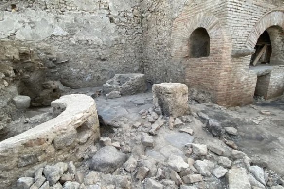 The “bakery-prison” where slaves and donkeys were confined to grind grain for bread.
