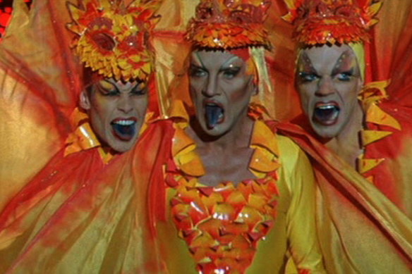 From left, Guy Pearce, Terence Stamp and Hugo Weaving in frill-necked lizard costumes.