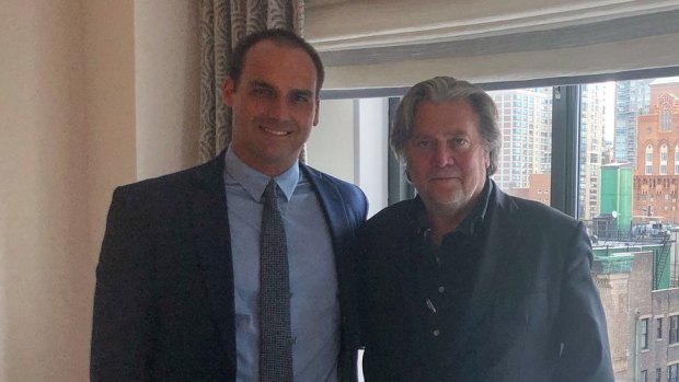 Brazilian congressman Eduardo Bolsonaro, left, meets with Steve Bannon in New York in the lead up to his father's presidential election win in 2018. 