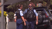 A large police presence remains on scene. 