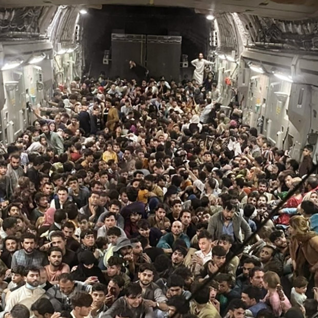 Afghans packed inside a US Air Force C-17 Globemaster III at Kabul airport on Sunday night.