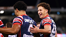 Mark Nawaqanitawase of the Roosters celebrates scoring a try.
