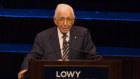 Frank Lowy speaks at the event commemorating the 20th anniversary of the Lowy Institute at Sydney Town Hall on Tuesday night.