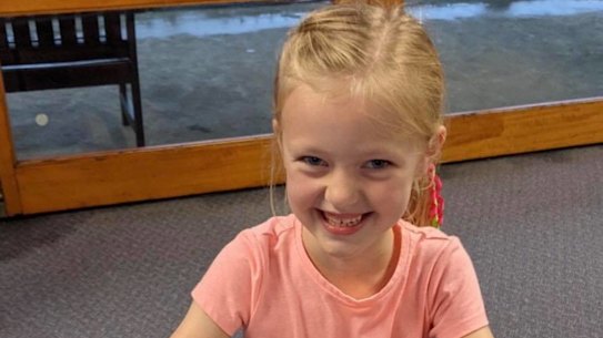 Jordan Marden stranded at her school due to floodwaters on her 7th birthday. 