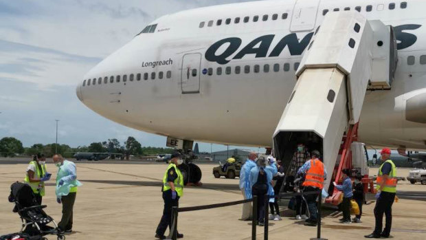 Passengers leave the flight. 