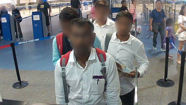 The 'fake' Indian journalists arriving at Brisbane Airport on Wednesday.