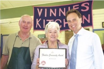 Rita receives a Flinders Community Award for her work at Vinnies Kitchen with Pat. 