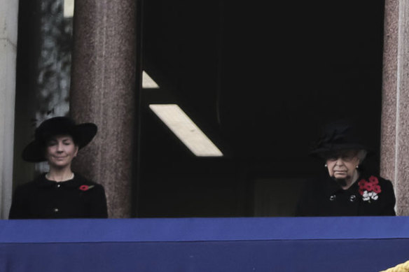 Queen Elizabeth II, second left, alongside Lady in Waiting, Susan Rhodes