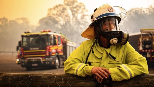 A Queensland firey takes a breather.